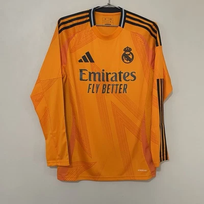 Adidas Real Madrid 2024/25 Manga Larga Naranja y Negro Tercera Camiseta Hombre Mediana  Foto 1 de 4