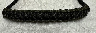 Eslinga de muñeca con lazo verde y negro Od Foto 1 de 4