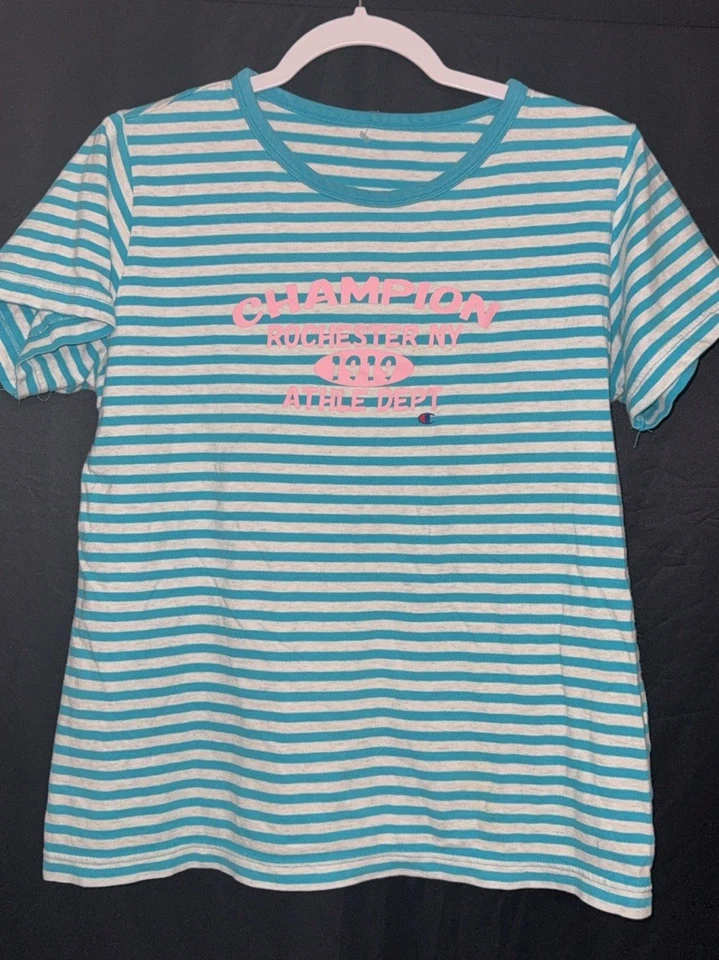 Top Champion Azul Rayas Manga Corta Rosa Logo Para Mujer Talla Mediana Usado Foto 1 de 1