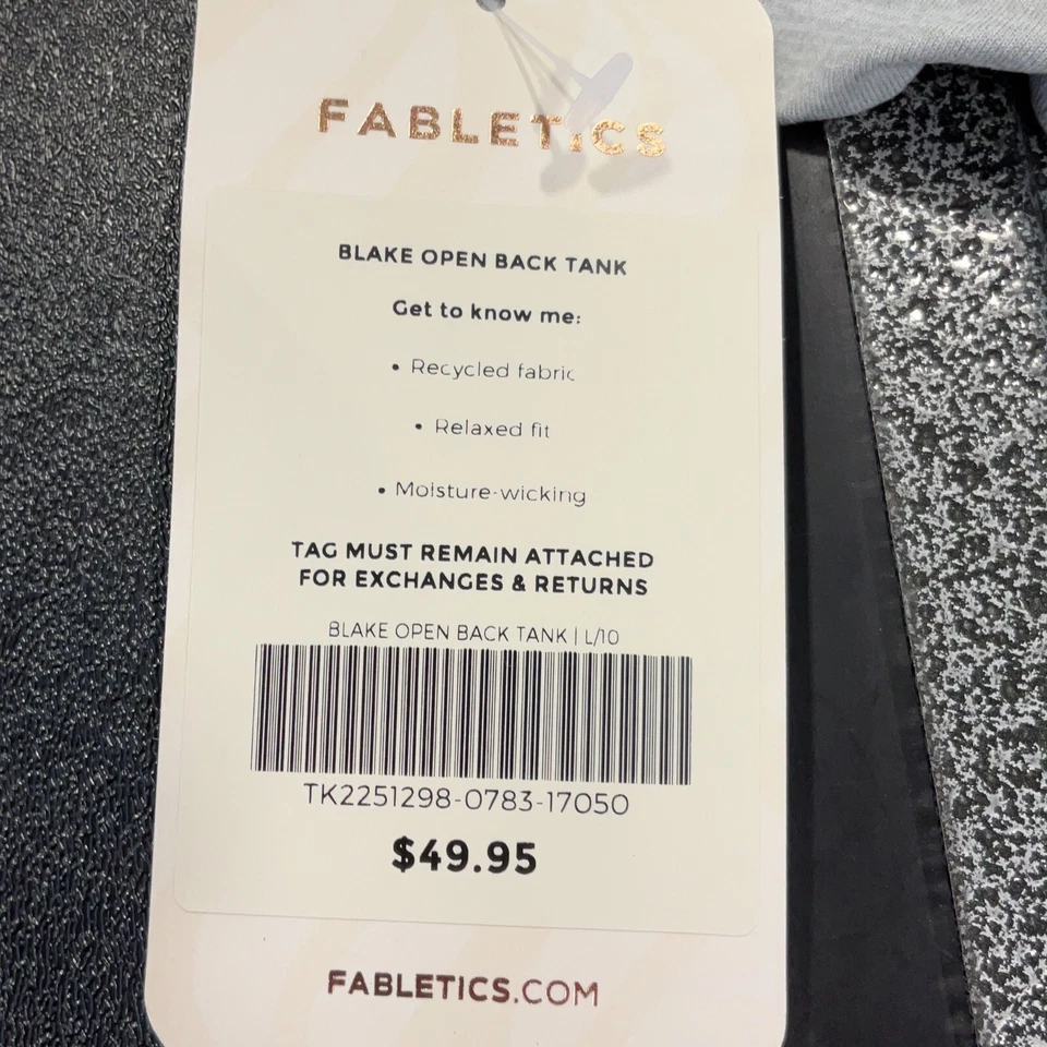 Camiseta sin mangas Fabletics negra espalda abierta para mujer talla L gris claro jaspeado calce relajado Foto 1 de 4