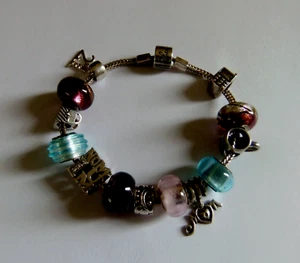 PULSERA CON DIJES DE PLATA DE LEY MACIZA - Imagen 1 de 5
