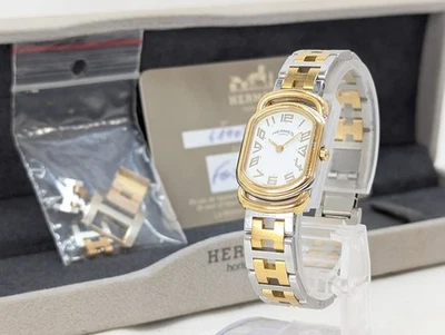 Reloj para mujer HERMES Rally cuarzo plateado dorado en caja funcionando auténtico Foto 1 de 4