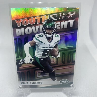 2022 PRESTIGE YOUTH MOVEMENT #14 ELIJAH MOORE NEW YORK JETS FOOTBALL - Image 1 of 2