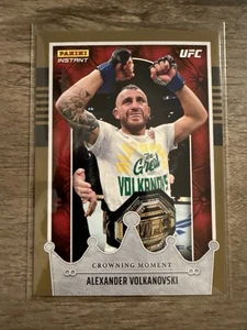 2022 Panini Instant UFC Crowning Moment Gold /125 Alexander Volkanovski #CM17 - Foto 1 di 2