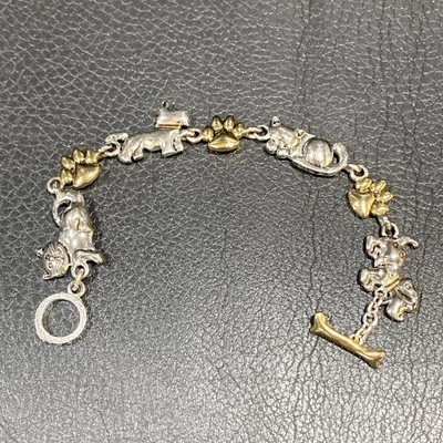 Brazalete de palanca diseño Premier tono plata/dorado estampado pata de gato perro encanto PD Foto 1 de 4