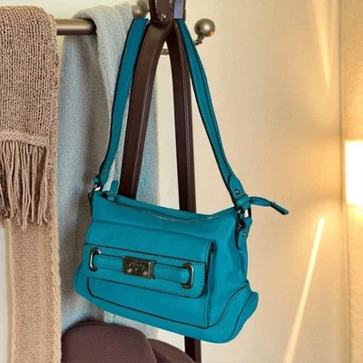 Bolso de hombro Chaps de cuero vegano turquesa Foto 1 de 4