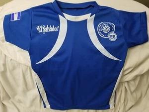 CAMISA DE LA SELECCIÓN DE EL SALVADOR PARA NIÑOS SIN ESCUDO - Picture 1 of 12