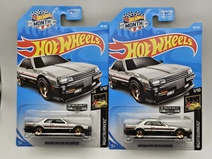 (2) HOT WHEELS 2019 MESE ZAMAC 005 WALMART ESCLUSIVA NISSAN SKYLINE RS (KDR30) - Foto 1 di 8