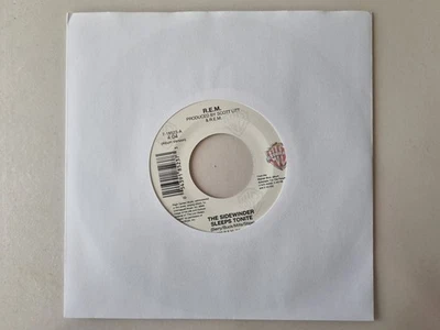 R.E.M. - The Sidewinder Sleeps Tonite/ The Lion Sleeps Tonight 7'' Vinyl US - Image 1 of 4
