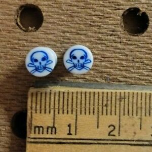1 Pair 4mm 6g Dbl. Flared Acrylic Ear Plugs. Skull & Crossbones. White/Blue