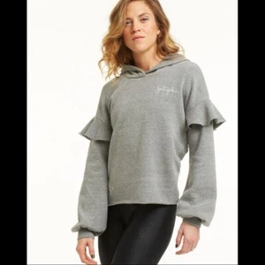 Neu mit Etikett Soul Cycle x Nation Ltd grauer Langarm-Hoodie mit Rüschen bestickt Small - Bild 1 von 8