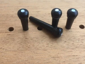 Pasadores de puente para guitarra acústica tenor, ébano, sin ranurar, punto perla - Imagen 1 de 2