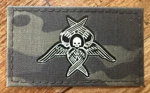 Parche Multicam Distrikt15 “Seraphim” Negro/Brilla en la Oscuridad Variante - Imagen 1 de 2