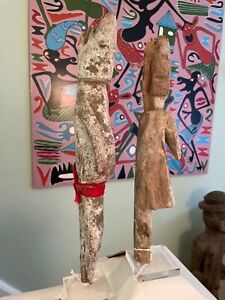 Pair of African Adan  tribal art shrine figures from Ghana.