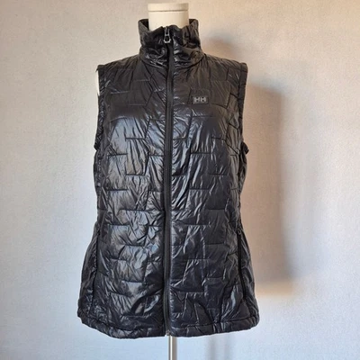 Chaleco ligero aislante Helly Hansen Lifaloft cuello alto cremallera negro para mujer L Foto 1 de 4
