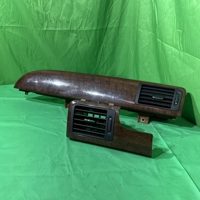 JUEGO DE VENTILACIÓN DE AIRE MOLDURA TABLERO NISSAN ARMADA 2006-2012 LADO CONDUCTOR/PASAJERO MADERA Foto 1 de 4