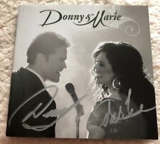 DONNY AND MARIE OSMOND  CD Signed AUTOGRAPHED Beckett Authentic