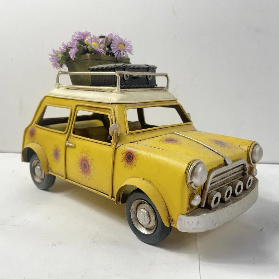 Mini carro amarelo modelo lata floral hippie carro colecionadores modelo mala e flores - Imagem 1 de 4
