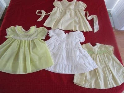 Vtg baby girl's dresses smocked embroidery lace 3 yellow, 1 white mixed lot of 4 - Image 1 of 4