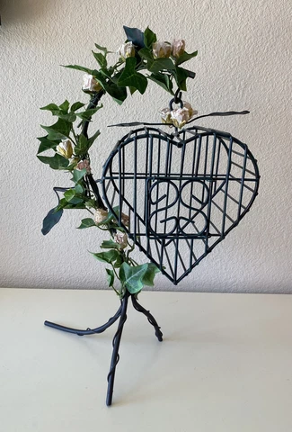 Decorative Green Metal Ivy Bird Cage with Pink Roses door opens display on Shelf Cover
