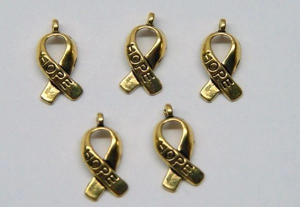 50 Dijes Tibetanos Antiguos DORADOS Cinta de Concienciación del Cáncer ESPERANZA Plomo + Sin Níquel Foto 1 de 1