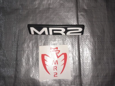 1991-1993  Toyota MR2 SW20 TAIL LIGHT CENTER PANEL LOGO TRIM BADGE WHITE OEM 92 - Изображение 1 из 3