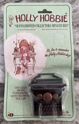 Máquina de escribir Holly Hobbie #19 metal nueva en paquete miniatura vintage 1976 Durham Industries Foto 1 de 4