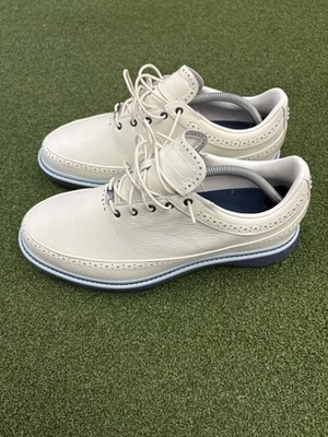 Zapatos de golf Adidas MC80 Oxford sin clavos para hombre (9,5, crema/azul marino) Foto 1 de 4