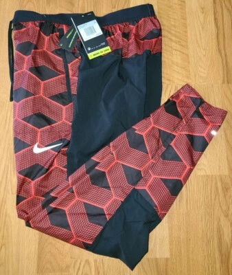 $110 Nike Kenya Shield Pantalones de Correr Rojo/Negro Para Hombre Talla XS CV0398-673 NUEVOS CON ETIQUETAS Foto 1 de 2