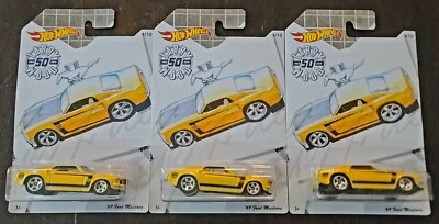 Ford Mustang 2019 Larry Wood 50 aniversario 69 amarillo Hot Wheels (lote de 3) Foto 1 de 2