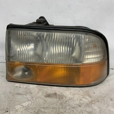 Conjunto de faros GMC Jimmy 1998-2004 lado del conductor OEM Foto 1 de 4