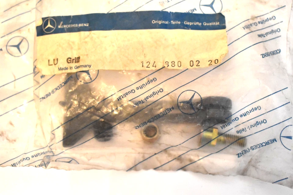 KIT DE MANIJA DE LIBERACIÓN DE CAPÓ ORIGINAL NOS MERCEDES-BENZ W124 300E, CE, TE, D, TD Foto 1 de 3