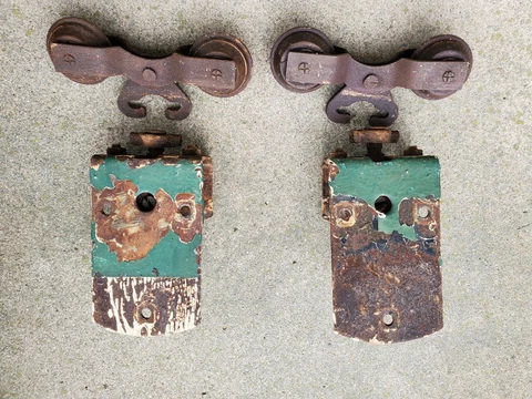Two (2) Antique CannonBall Barn Door Rollers Hangers with Brackets Rusty Pair Cover