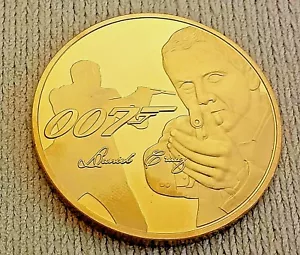 Moneda de Oro James Bond 007 Dama Desnuda Mujer Espía Películas Finger No Time to Die Espía Reino Unido - Imagen 1 de 9
