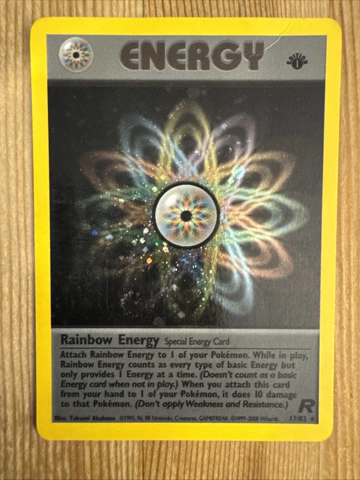 Rainbow Energy 17/82 - Team Rocket 1st edition (2000) Vintage WOTC Holo Rare DMG - Image 1 of 3