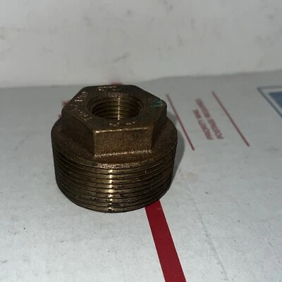 Buje reductor de latón de 1 1/2" x 1/2" - Buje hexagonal de latón de 1 1/2" x 1/2" Foto 1 de 2
