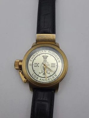 Reloj de pulsera Christian Audigier para hombre zurdo tono dorado correa negra funcionando Foto 1 de 4