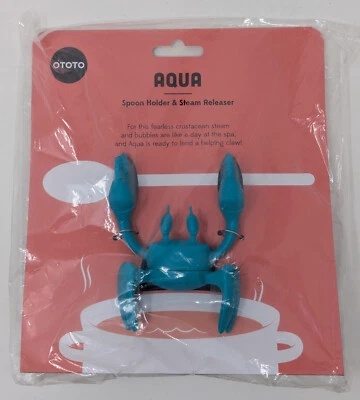 Ototo Aqua Cangrejo Cuchara de Silicona Soporte para Utensilios y Liberador de Vapor NUEVO EN PAQUETE Foto 1 de 2