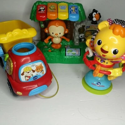 Lot of 3 VTech toy lot-learn and dance,twist and spin loin,drop and go dump truc - Image 1 of 4
