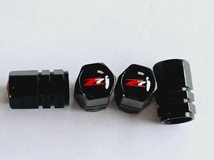 4 Black Valve Stem Cover Caps Hexagonal Fits Z71 - Picture 1 of 3