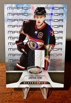 2011-12 PANINI CERTIFIED JONATHAN TOEWS MIRROR GOLD PRIME JERSEY PATCH #ED /25 - Image 1 of 2