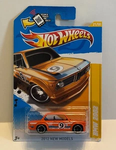 Hot Wheels BMW 2002 2012 NEW MODELS ORANGE ERROR - NO PLASIC WINDOWS/WINDSHIELD - Picture 1 of 12