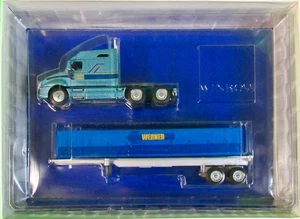 Modelo de camión Winross 1999 Werner Enterprises carga plana envuelta escala 1/64. - Imagen 1 de 3