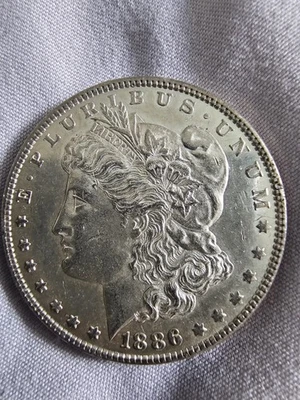 1886 $1 Morgan Dollar BU. Foggy Mirror. 727B - Image 1 of 4