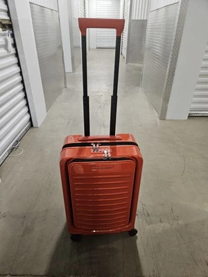 Bric's Porsche Design Roadster 21" Expandable Hardside Spinner Orange - Image 1 of 4