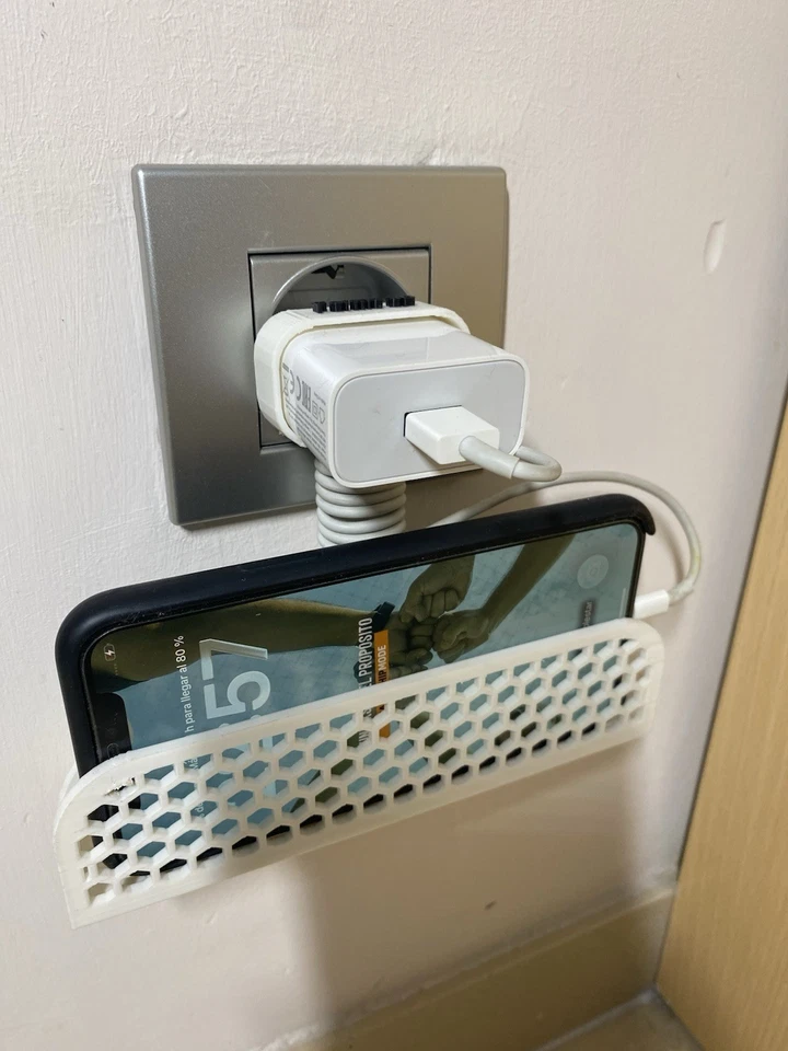 Soporte de pared para cargar móvil. - Imagen 1 de 4