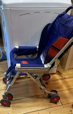 Cochecito de bebé vintage años 80 Aprica Japón rayas azules mango reversible SE ENVIARÁ Foto 1 de 4
