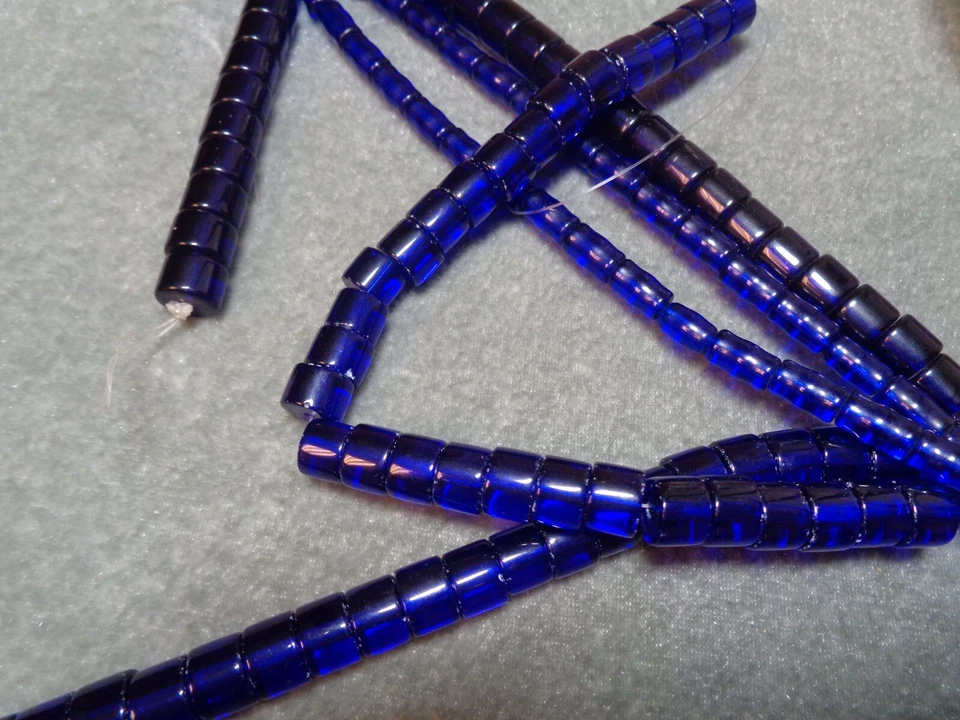 Abalorio, vidrio, cobalto oscuro transparente, cuervo 9x7mm, cilindro 8x9, tubo 9x5. Foto 1 de 1