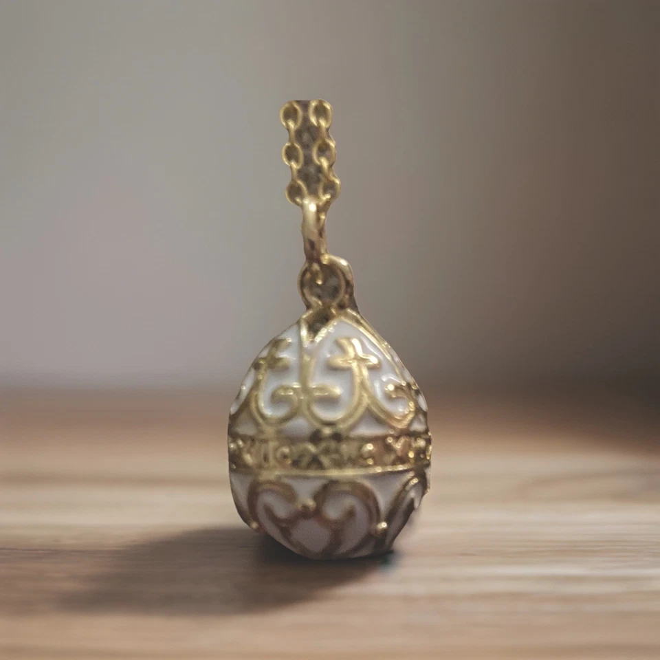 Faberge Egg Necklace White And Gold 18” Chain - Image 1 of 1