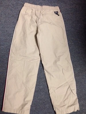 Pantalones Gap talla XL 12 para niños con ribete rojo tostado  Foto 1 de 4